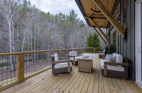 Talking Rock House | Modern Riverfront Cabin Hot Tub Deck Views