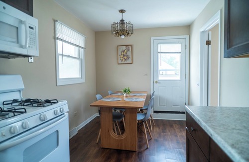 Mundelein Apartment | Modern Rooftop Retreat in Downtown Mundelein