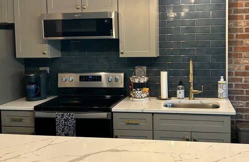 East Dundee Apartment | Modern studio loft located in the heart of the Culinary District in East Dundee!