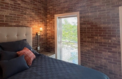 East Dundee Apartment | Modern studio loft located in the heart of the Culinary District in East Dundee!