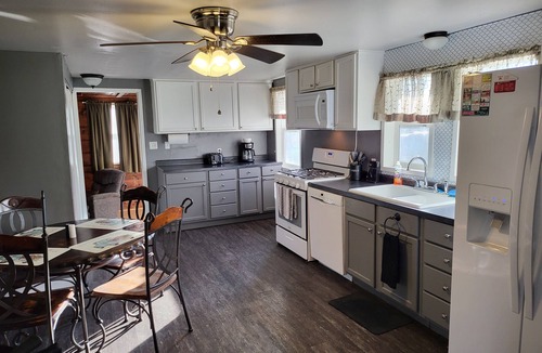 Olney House | Park Place-Quaint home nestled between parks and lakes