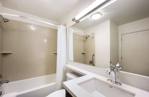 Libertyville Hotel | Perfect for Groups! 4 Cozy Hotel Suites with Kitchens! Pet-Friendly
