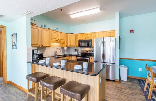 Kill Devil Hills Condo | Pet-friendly, centrally-located oceanside condo w/community pool!