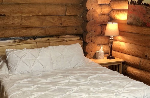Edwardsville Cabin | PRIVATE LOG CABIN RETREAT! Secluded Cabin in Woods with Pond and Bike Trail!