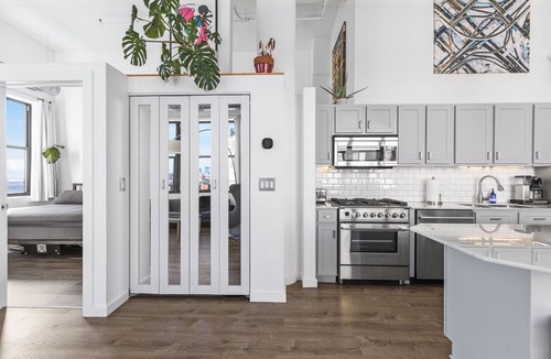 University Village / Little Italy Apartment | Private Room + Bathroom In Historic Luxury Loft w Skyline Views & Balcony