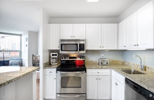 Rush and Division Apartment | Quaint River North 1BR w/Gym + W/D near Mag Mile by Blueground