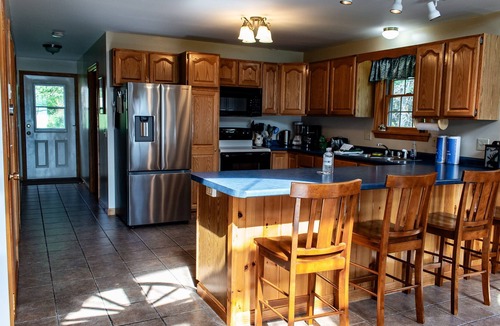 Oquossoc House | Rangeley Lake House in Oquossoc Cove, with hot tub