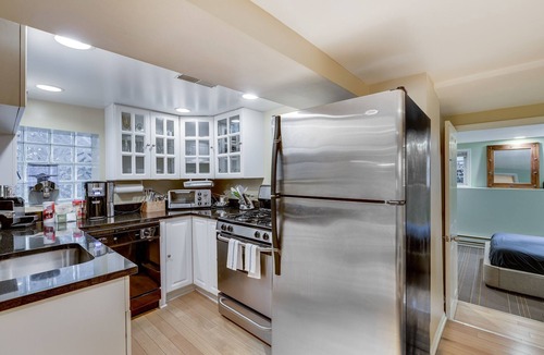 Pulaski Park Apartment | Relax in Winter Park - You Will LOVE the Garden Access and the Classic, Comfortable Feeling by AllSet Turnover