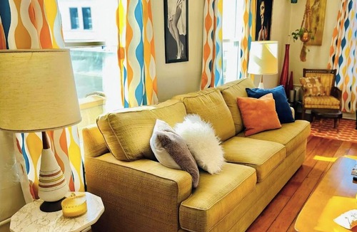 Moline Apartment | Retro & Modern Downtown w/Deck, Fire Pit, Pac Man
