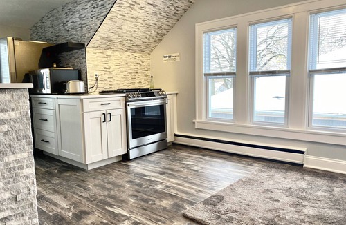 Rockford House | Rockford 2BD w/EV Charger, Patio & Fast WiFi, Upscale Furnished Rentals in Rockford, IL | Ideal Sho