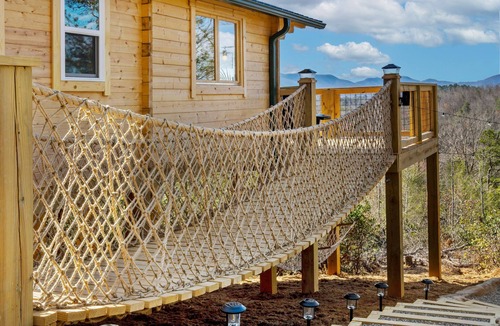 Old Fort Cabin | Romantic Treehouse with Hot Tub, Waterfall, Hiking, Swinging Bridge & Goats