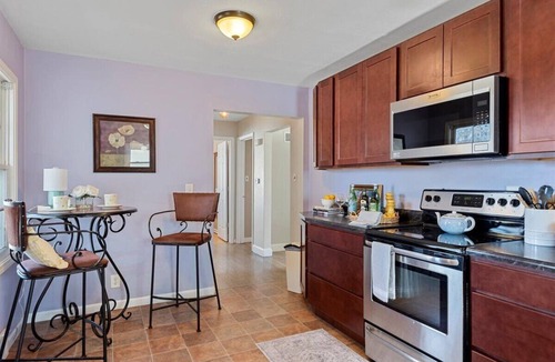 Springfield House | Room to Bloom, Upscale Home - Laundry Garage Yard