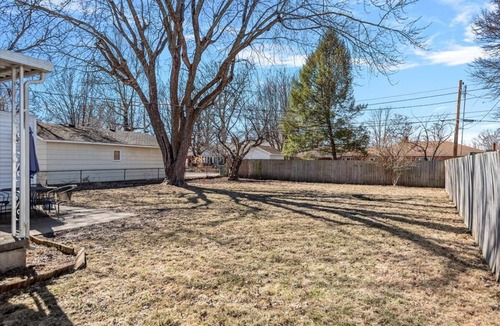 Springfield House | Room to Bloom, Upscale Home - Laundry Garage Yard