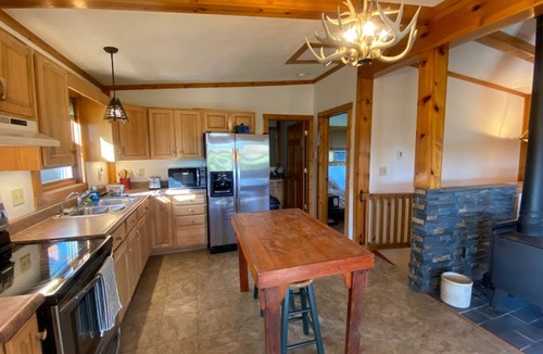 Opheim Cabin | Rustic and Secluded 1 Bedroom Cabin Retreat. Located on Private Stocked Pond.