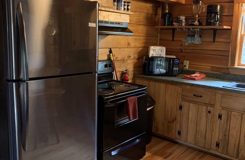 Rogers Cabin | Secluded A-Frame Cabin with a private waterfall at Spirit Lake and internet