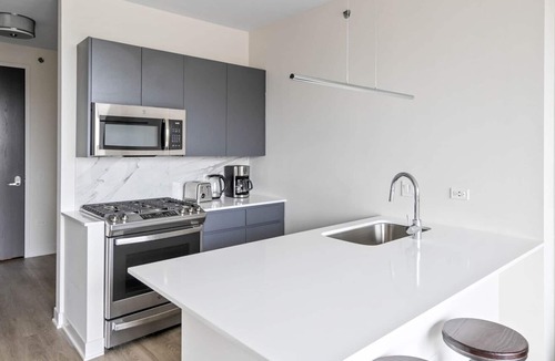 River West Apartment | Sleek River West 1BR w/ Rooftop & Gym, steps to Blue Line, by Blueground