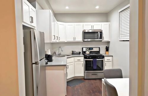 Boystown Apartment | Smart & Stylish 2-Bedroom Unit