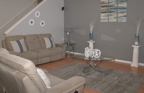 Streamwood House | Spacious 3 bedroom home with King bed/Queen bed. Fun game room and Theater room.