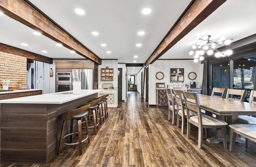 McHenry House | Spacious A-Frame sleeps 25 on 5 wooded acres with a private fishing pond
