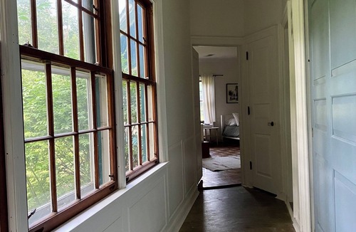 Holcomb House | Spacious Hillside Home Overlooking Private Woods