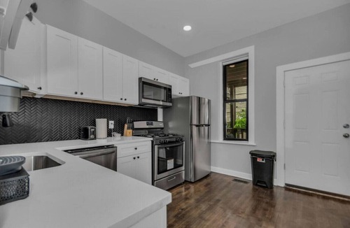 Lakeview Apartment | Spacious Wrigley Duplex | Large Entertainment Room