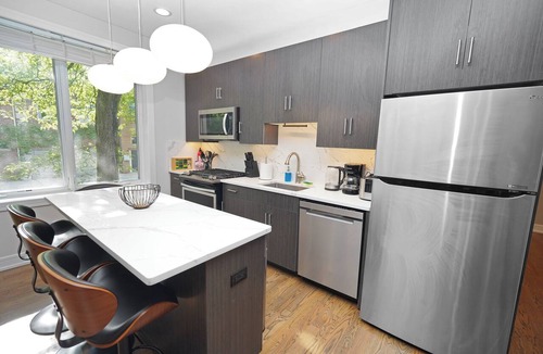 University Village / Little Italy Hotel | Stylish 5BR West Loop Retreat with Optional Parking