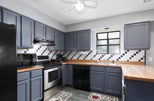 Collinsville House | Touch of Class 3-bedroom townhome in Belleville King Bedroom.