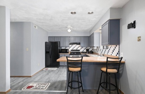 Collinsville House | Touch of Class 3-bedroom townhome in Belleville King Bedroom.