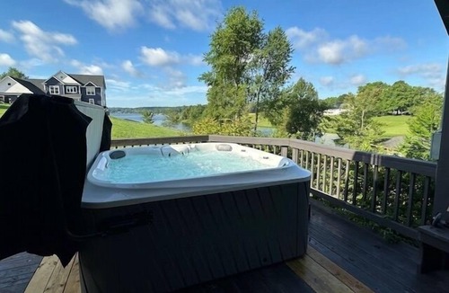 Livingston House | Updated lakefront home & studio with water views, hot tub, dock & game room