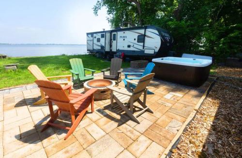 Spring Grove House | Waterfront 2BR Nautical Cottage on Grass Lake Hot Tub, Firepit, Year Round Fun