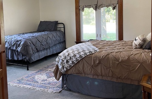 Marshall House | Welcoming hometown retreat with pool, hot tub and fenced in yard.