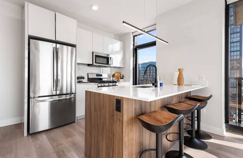 West Loop Apartment | West Loop Scenic Views + Private Balcony Retreat