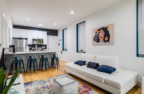 Pulaski Park Apartment | Windy City Wow! Private Deck, Pet Friendly, and Free Parking! by AllSet Turnover