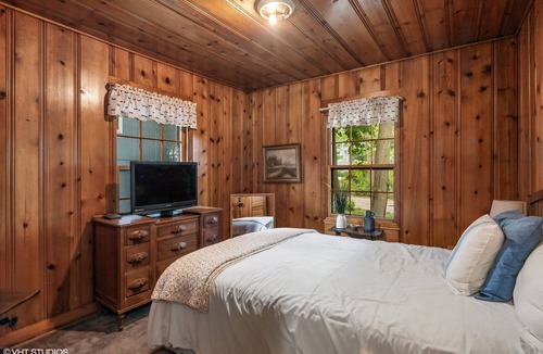Antioch House | wonderful log home Chain o Lakes waterfront home with pier Monthly rental