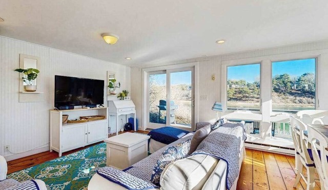 Breathtaking Riverfront Home with a Lovely Deck, Close to Beach - Dogs OK