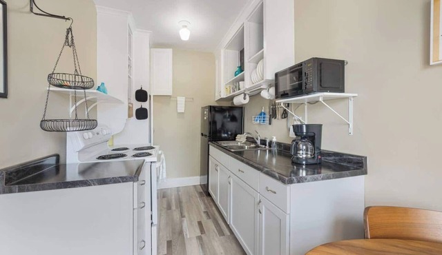 Experience a refined retreat at this elegant apartment situated in the vibrant center of downtown Two Harbors, Minnesota.