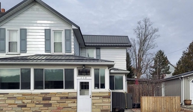 Ideal Location + Gathering Space + Art Deco Design + Designated Work Area