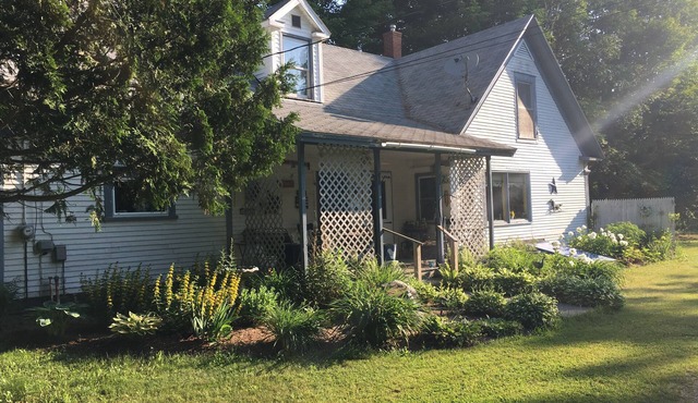 Lakeview Farmhouse with private beach access and on snowmobile VAST trail.