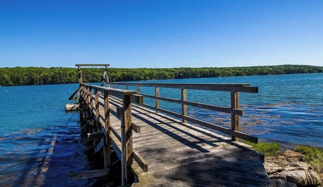 Private waterfront home with large deck & deep water dock