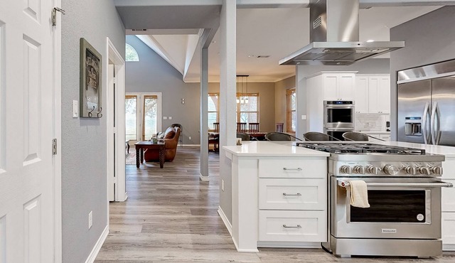 Serene waterfront house with pool table, game room and lake views