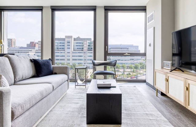 Tasteful Medical District 1BR w/ Gym + W/D, 1 block to L, by Blueground