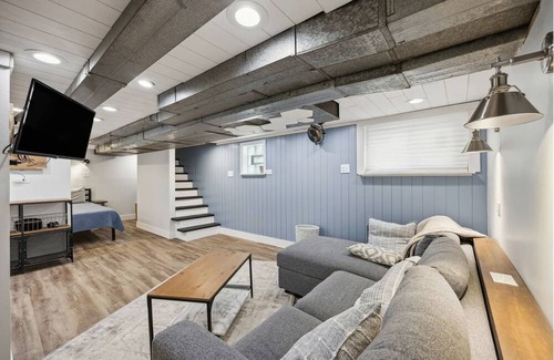 Forest Park Apartment | City-Accessible Basement Retreat