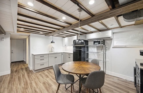Forest Park Apartment | City-Accessible Basement Retreat
